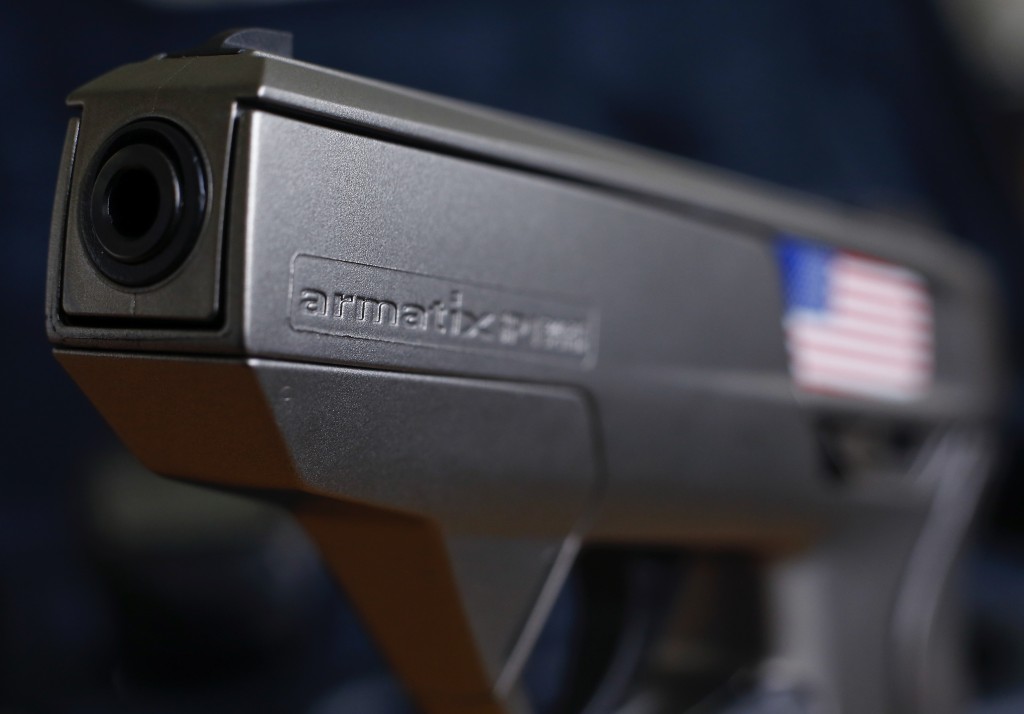 A smart gun by Armatix is pictured at the Armatix headquarters in Munich May 14, 2014. Photo by Michael Dalder/Reuters